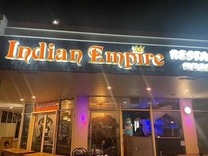 Entrance and signage of Indian Empire restaurant on Runaway Bay, a commercial cleaning client