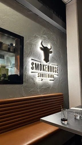 Interior seating area at Smokehouse Meat & Co Grill & Bar, a commercial cleaning client