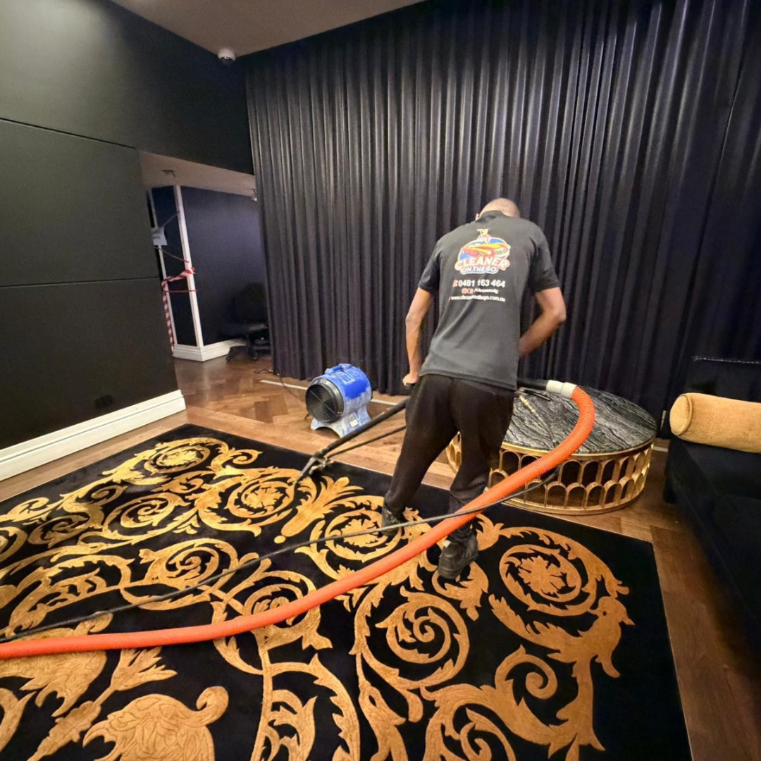 Cleaner On The Go technician cleaning a property, Australia